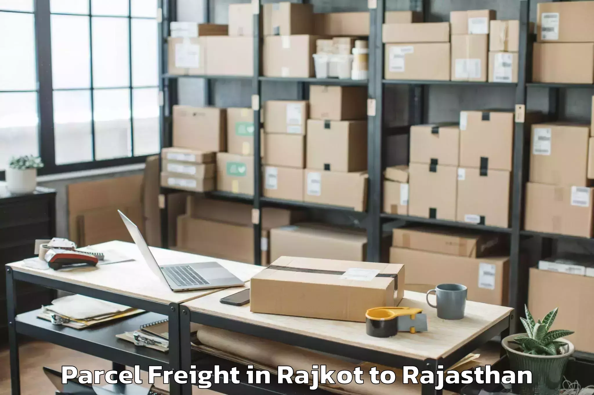 Top Rajkot to Pratap University Jaipur Parcel Freight Available